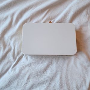 White acrylic and wood hard sided clutch with gold chain strap